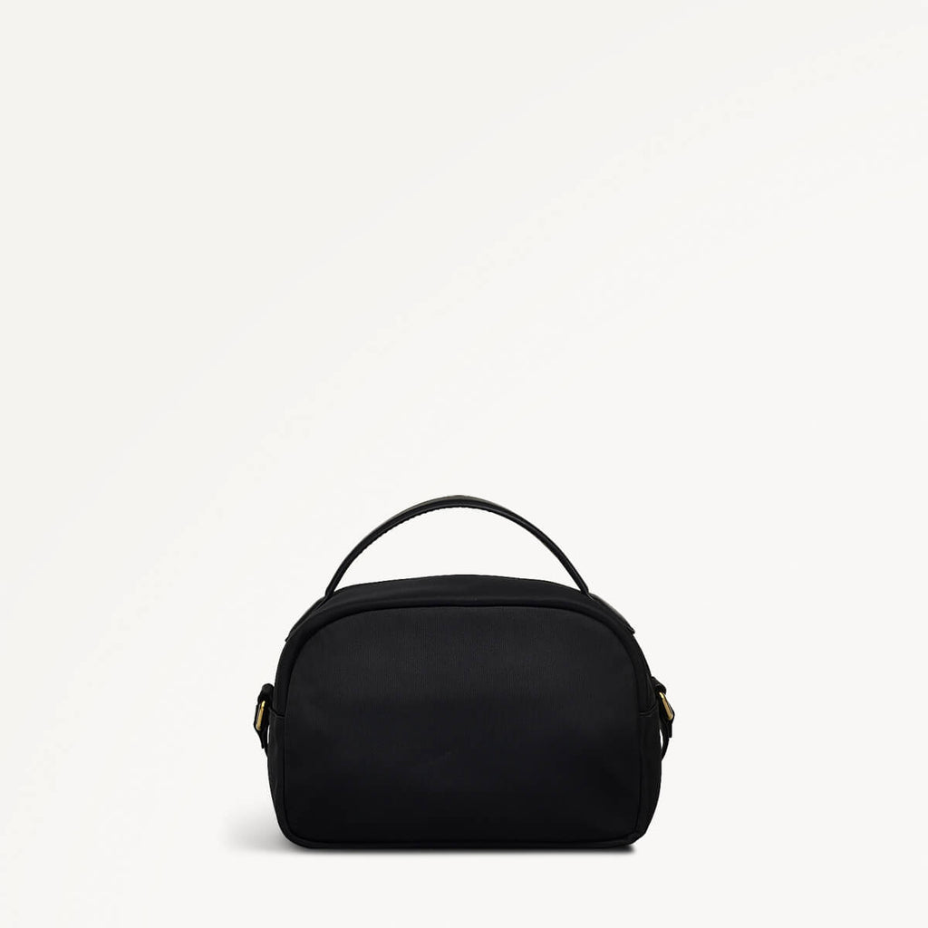 Montague Lane Fabric Mini Zip Around Crossbody Bag in Black - 110402