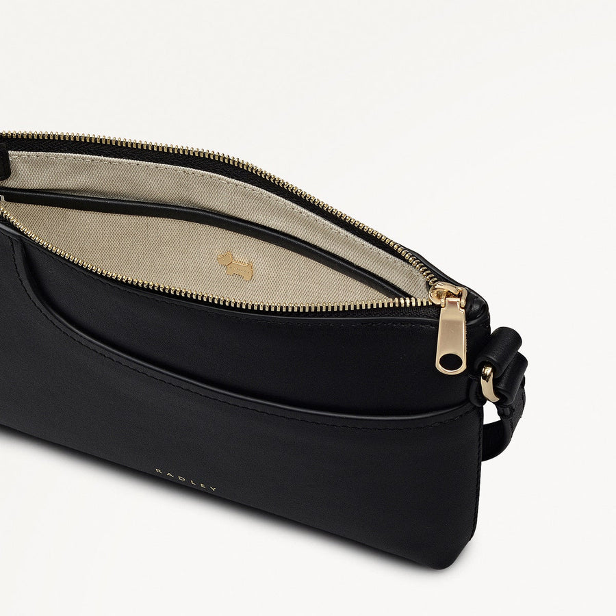 Pockets Leather Mini Ziptop EW Shoulder Bag in Black - 112144