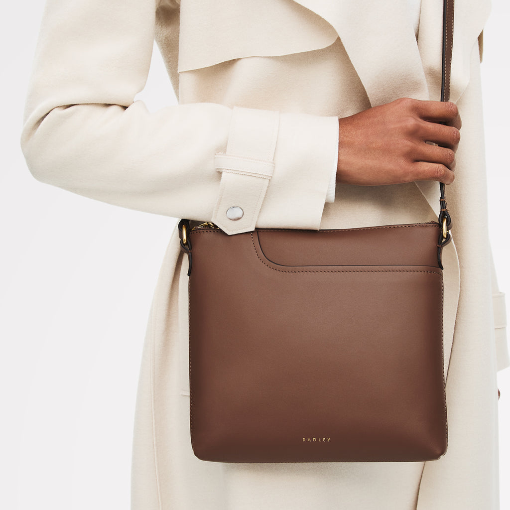 POCKETS SMALL ZIPTOP NS CROSS BODY SADDLE