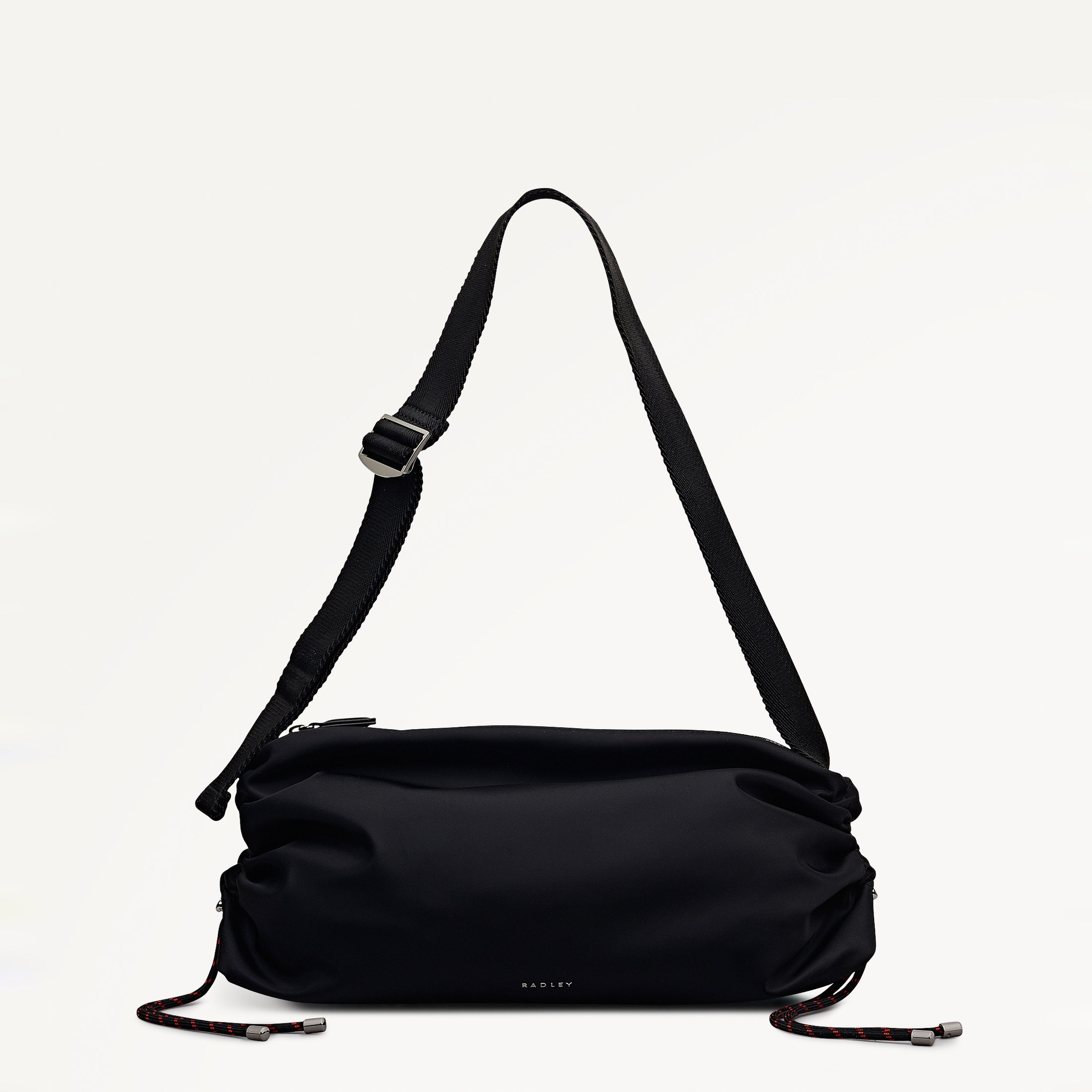 Black shoulder bag with a strap on a white background