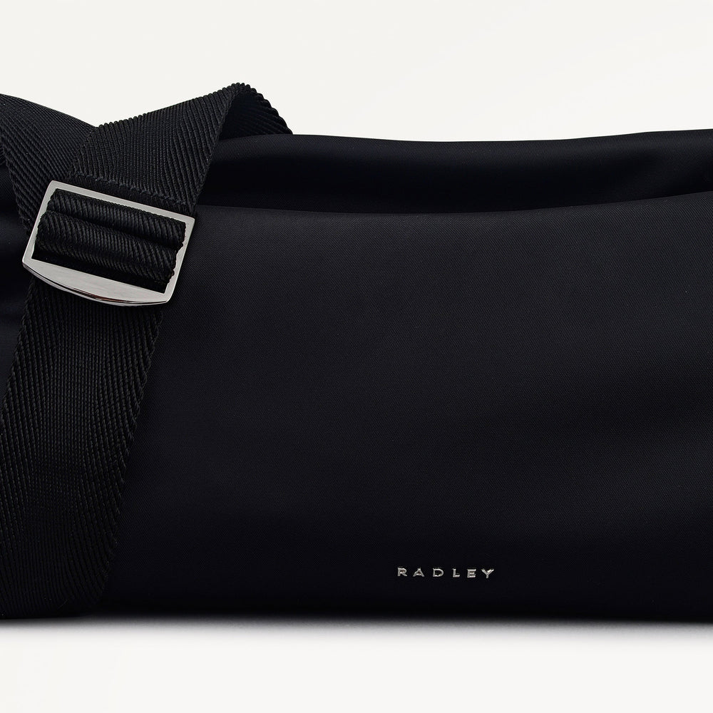 Eden Row Fabric Medium Ziptop Cross Body Bag in Black - 112321