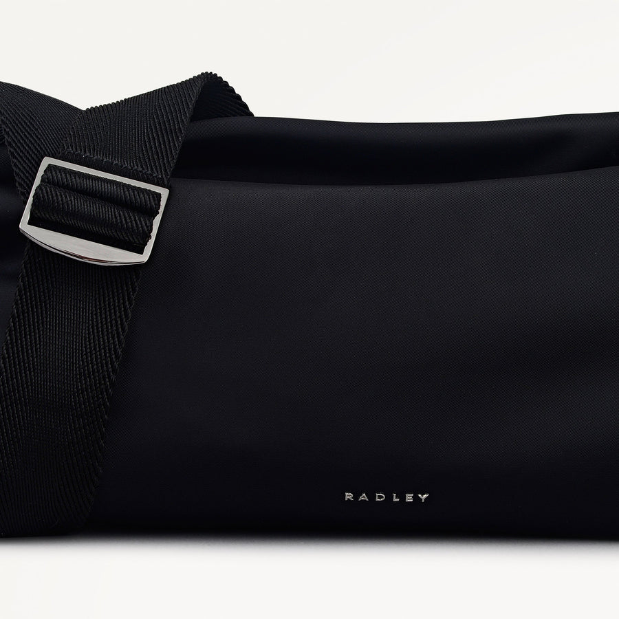 Eden Row Fabric Medium Ziptop Cross Body Bag in Black - 112321