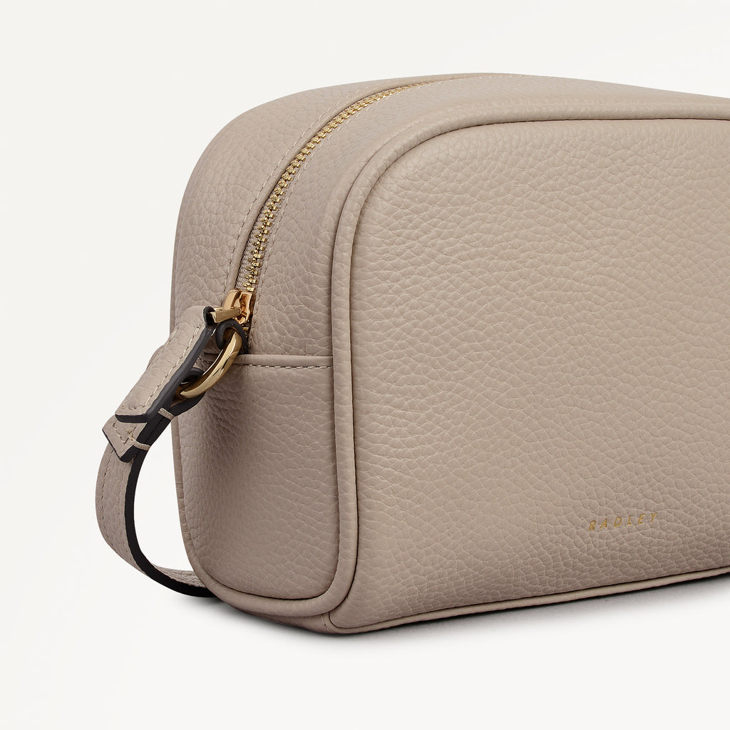 THE DAILY SMALL ZIP AROUND CROSS BODY PORCINI