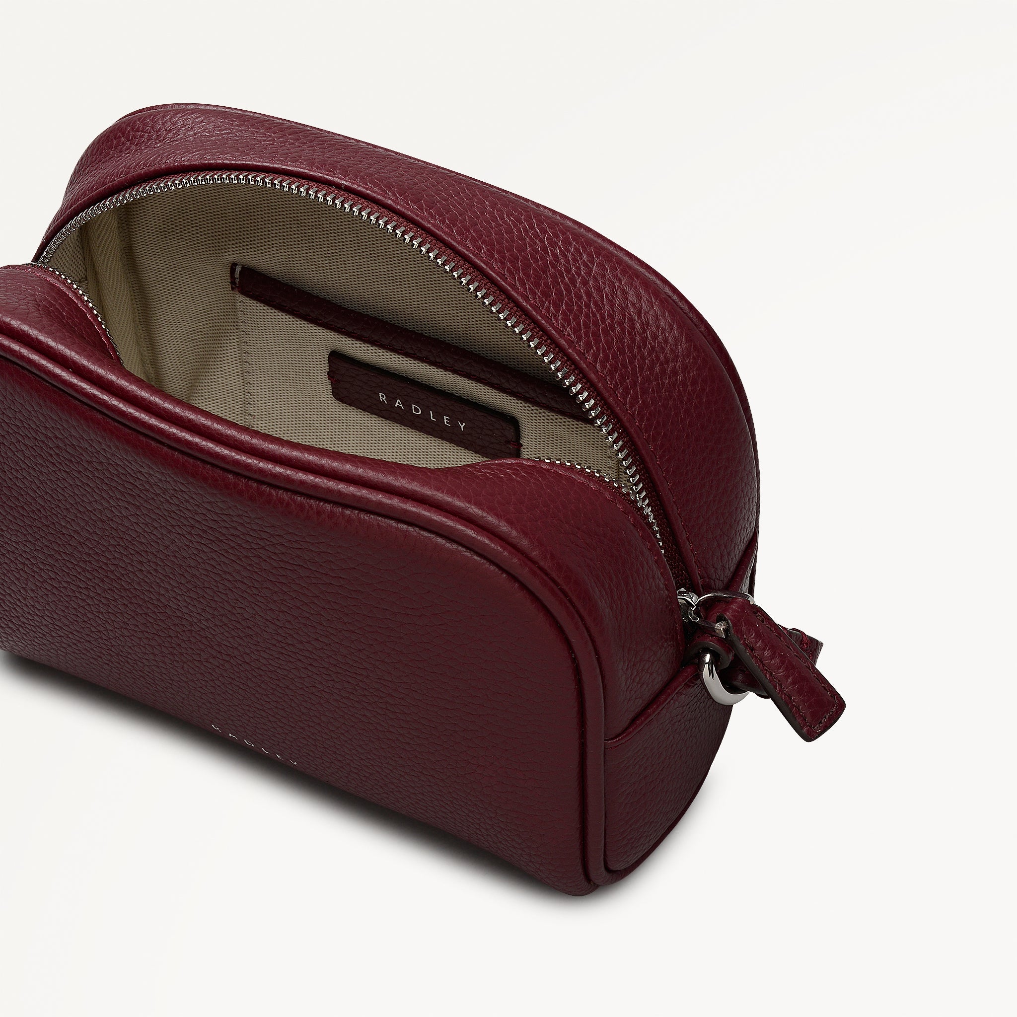 THE DAILY SMALL ZIP AROUND CROSS BODY DARK CHERRY