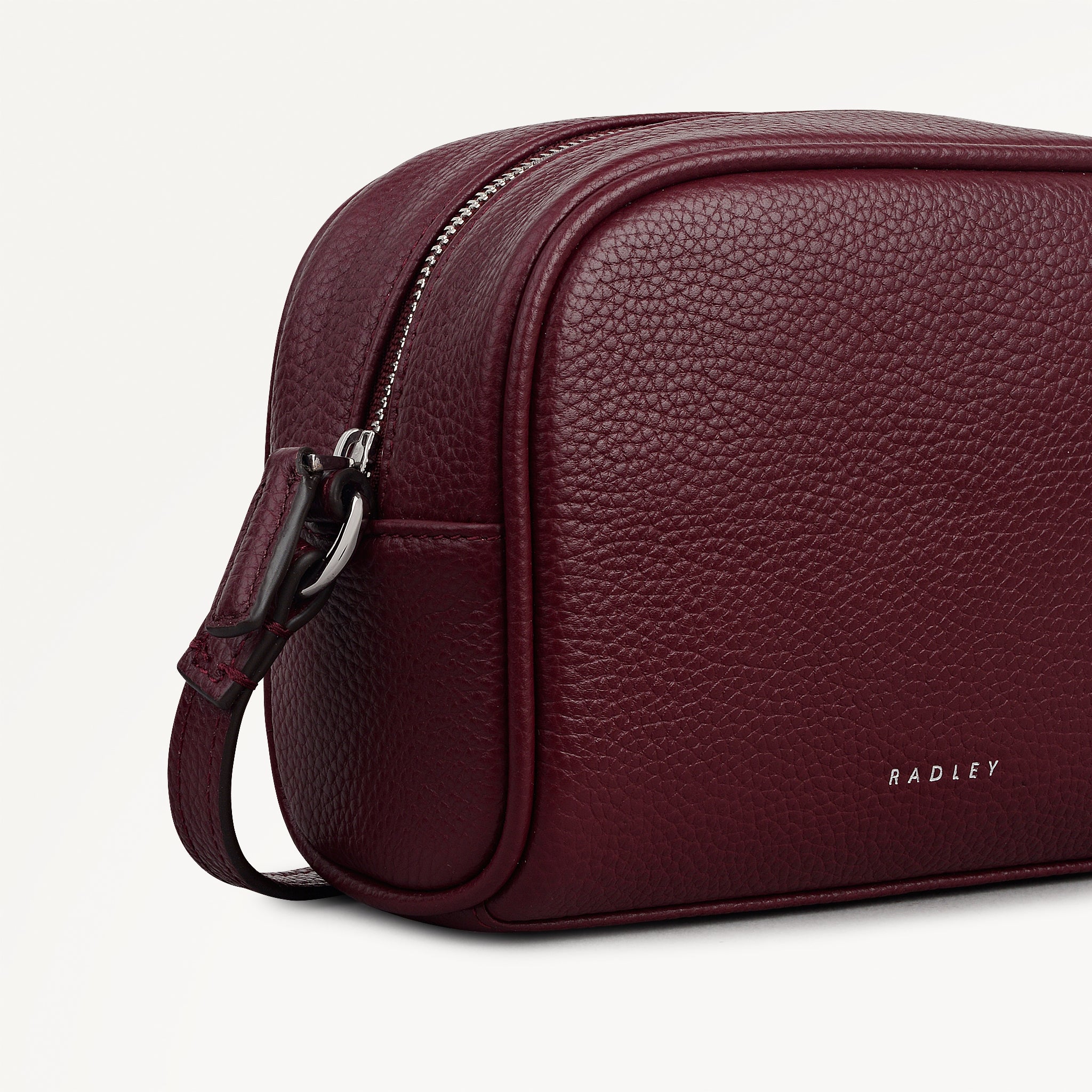 THE DAILY SMALL ZIP AROUND CROSS BODY DARK CHERRY