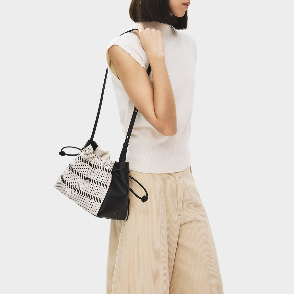 The Roxburgh - Perforated Medium Drawstring Cross Body Black - 113509