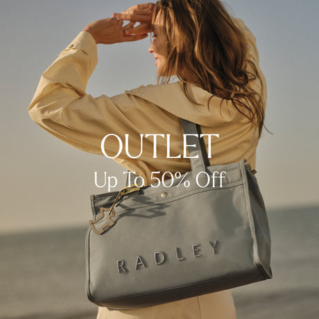 Woman holding a Radley bag with 'OUTLET Up To 50% Off' text overlay.