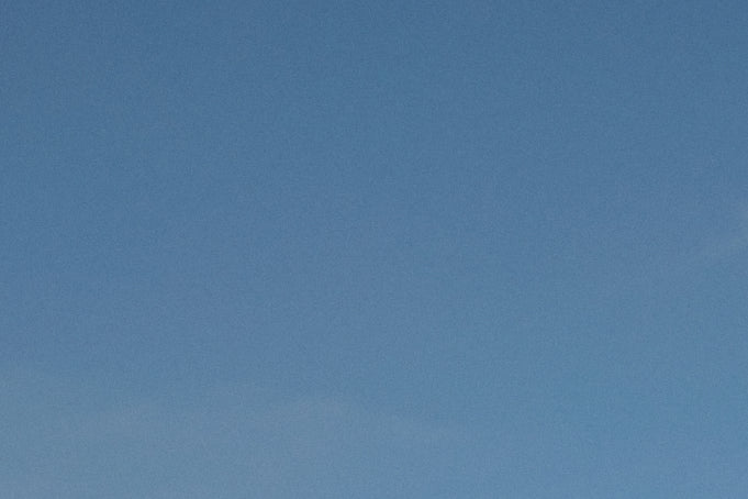 Clear blue sky with minimal cloud presence
