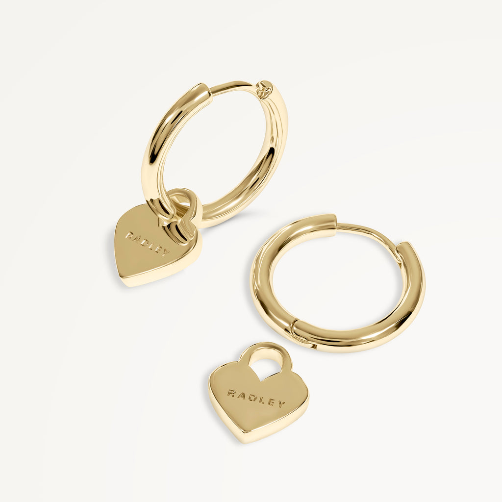 SELSEY STREET HANGING HEART HUGGIE EARRINGS GOLD