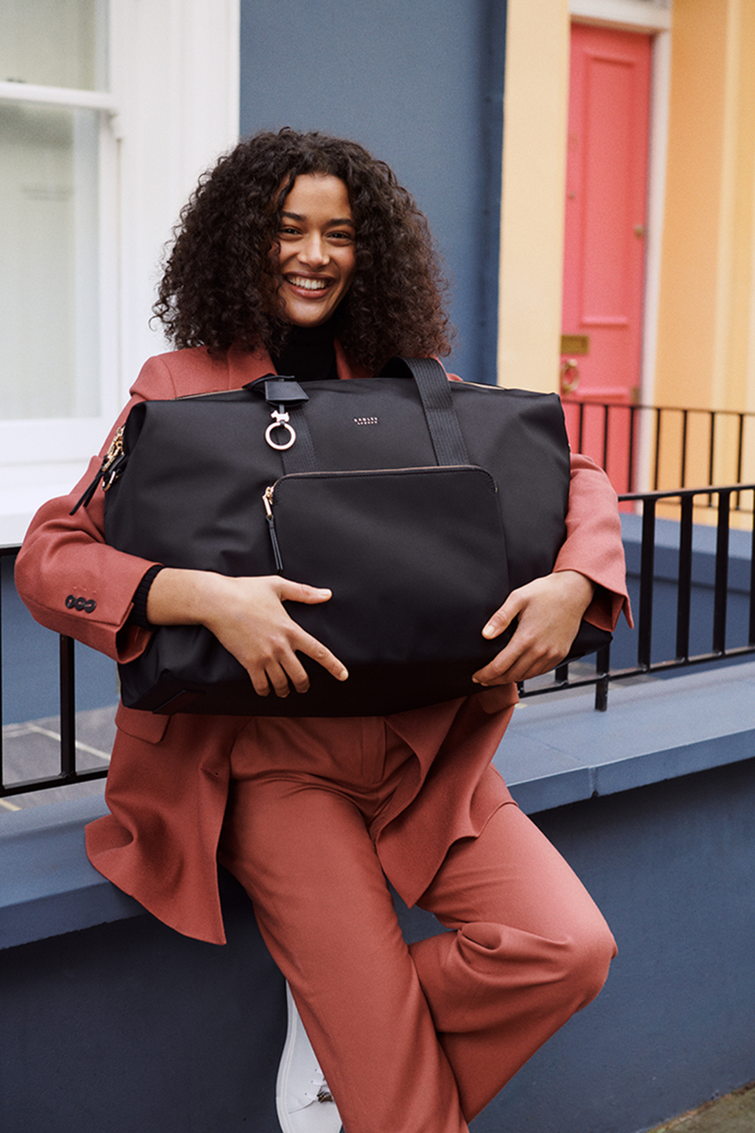 Radley London black leather purse, top handle bag